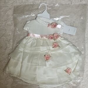 Elegant Cream Baby Dress with Pink Accents